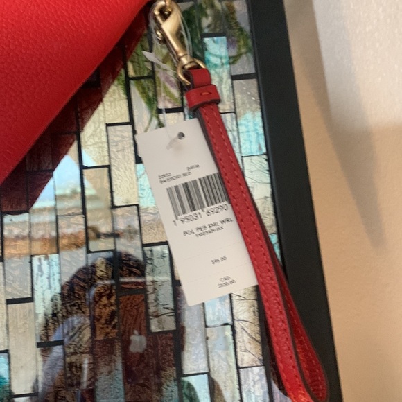 Coach Leather Wristlet
COACH - Picture 12 of 17